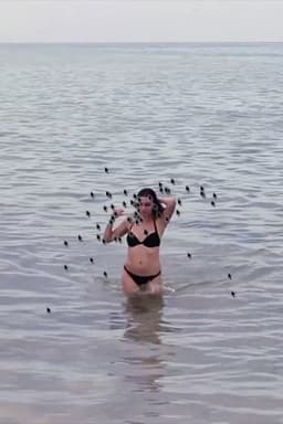 Hot Beach Babe Aims to Please